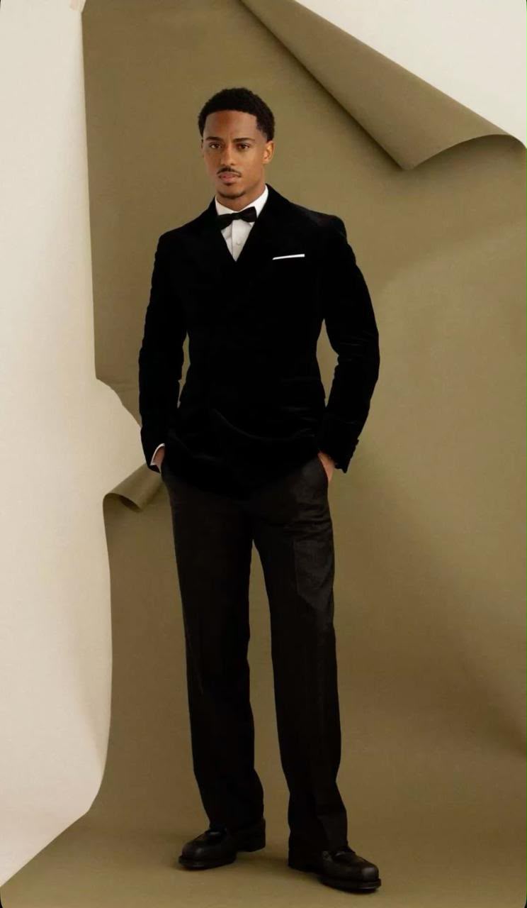 A black tuxedo with a white shirt and bow tie